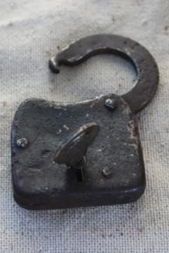 photo of rustic old antique padlock, iron lock w/ working key, worn original vintage patina