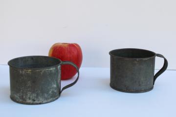 catalog photo of rustic primitive antique tin cups, old metal mugs early 1900s vintage toleware