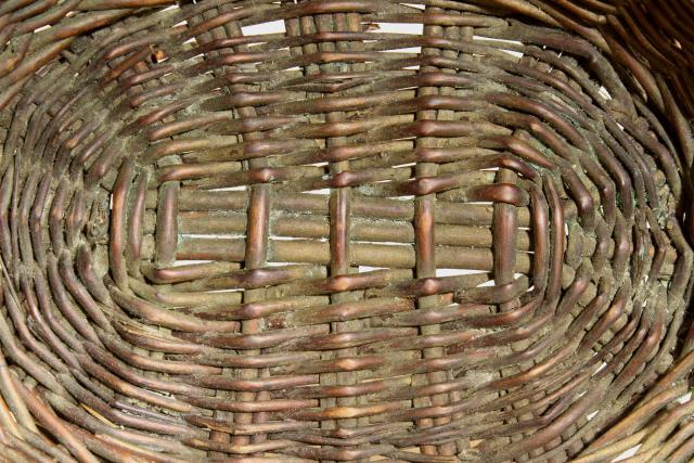 photo of rustic primitive woven basket, child
