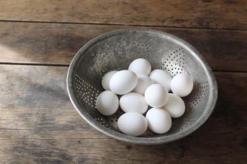 catalog photo of rustic vintage metal colander bowl / strainer, farmhouse style tin egg basket