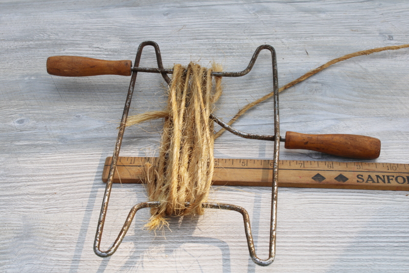 photo of rustic vintage primitive rope winder, wood handled wire frame w/ old rope baling twine #2