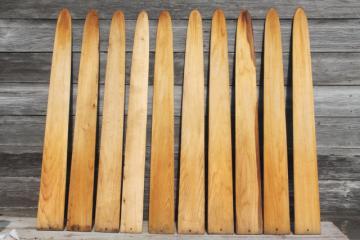 catalog photo of rustic wood pickets, fur trapper's pelt stretchers primitive cabin decor