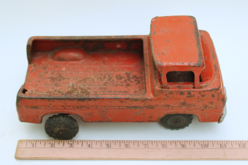 photo of rusty crusty vintage Nylint metal toy truck, mid century vintage Ford farm truck worn old red paint  #7