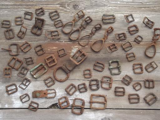 photo of rusty old iron buckles, primitive antique harness belt buckle collection #1