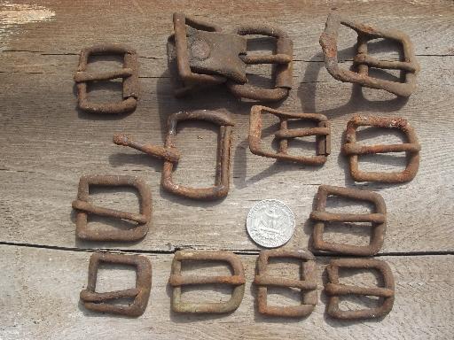 photo of rusty old iron buckles, primitive antique harness belt buckle collection #8