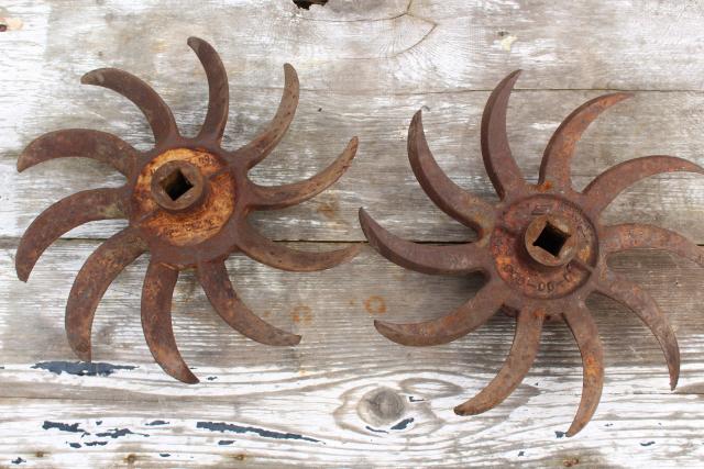 photo of rusty old iron sunburst gear wheels w/ curved blades machine age industrial #2