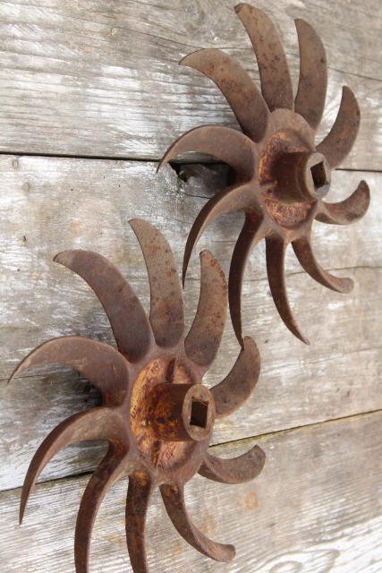 photo of rusty old iron sunburst gear wheels w/ curved blades machine age industrial #3