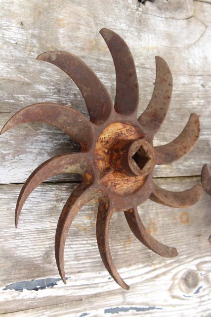 photo of rusty old iron sunburst gear wheels w/ curved blades machine age industrial #5