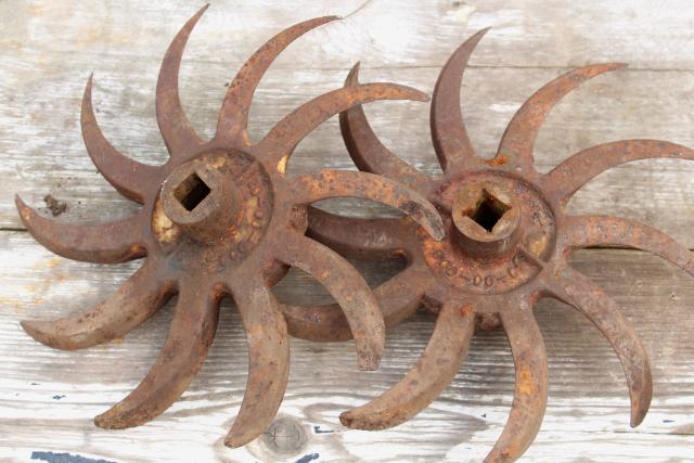 photo of rusty old iron sunburst gear wheels w/ curved blades machine age industrial #7