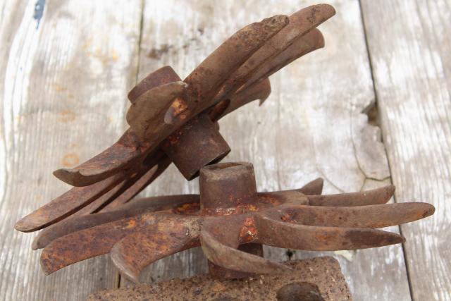 photo of rusty old iron sunburst gear wheels w/ curved blades machine age industrial #8