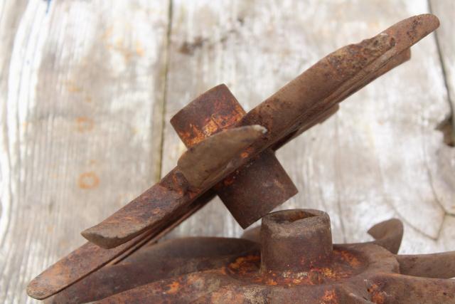 photo of rusty old iron sunburst gear wheels w/ curved blades machine age industrial #9