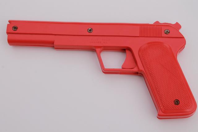 photo of sci-fi style vintage red plastic rubber band shooters, toy guns pair of pistols #2