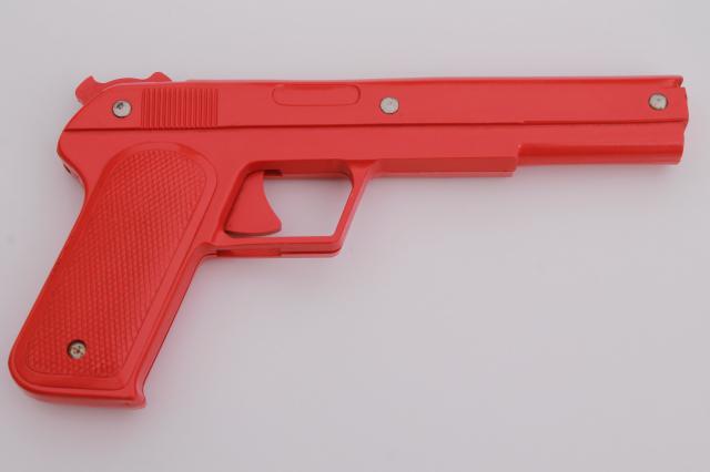 photo of sci-fi style vintage red plastic rubber band shooters, toy guns pair of pistols #3