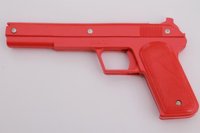 photo of sci-fi style vintage red plastic rubber band shooters, toy guns pair of pistols #4