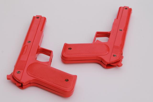 photo of sci-fi style vintage red plastic rubber band shooters, toy guns pair of pistols #7