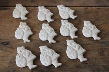 catalog photo of set of 10 plain white unpainted ceramic bisque Christmas ornaments Santa Claus 