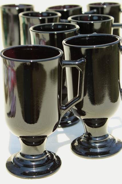 set of 8 footed cups or tall mugs, vintage black glass, Indiana Continental