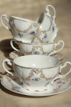 catalog photo of set of antique German bullion or cream soup bowls, double handled china cups w/ saucers