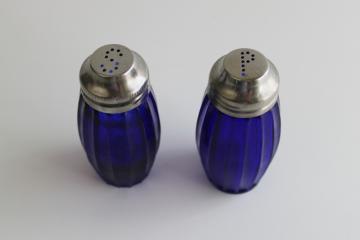 catalog photo of set of cobalt blue glass S&P shakers vintage reproduction ribbed jars w/ metal lids 
