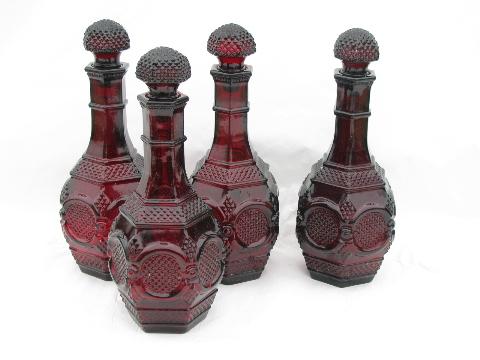 photo of set of four decanters, vintage Avon Cape Cod ruby red glass decanter bottles #1
