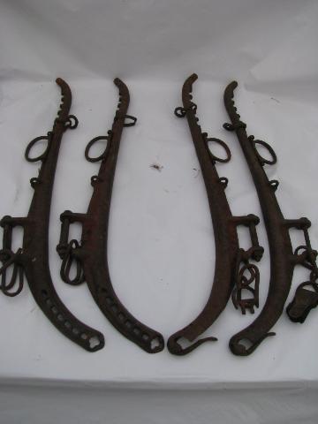 photo of set of primitive antique cast iron harness hames for team of horses, 1916 patent #1