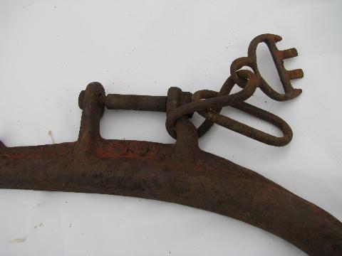 photo of set of primitive antique cast iron harness hames for team of horses, 1916 patent #5