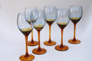 catalog photo of set of six big wine glasses or water goblets, Horizon blue glass dipped amber stem