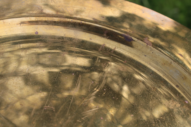 photo of set of six vintage solid brass chargers, large plates 11 and 3 quarters diameter heavy brass under plate trays #4