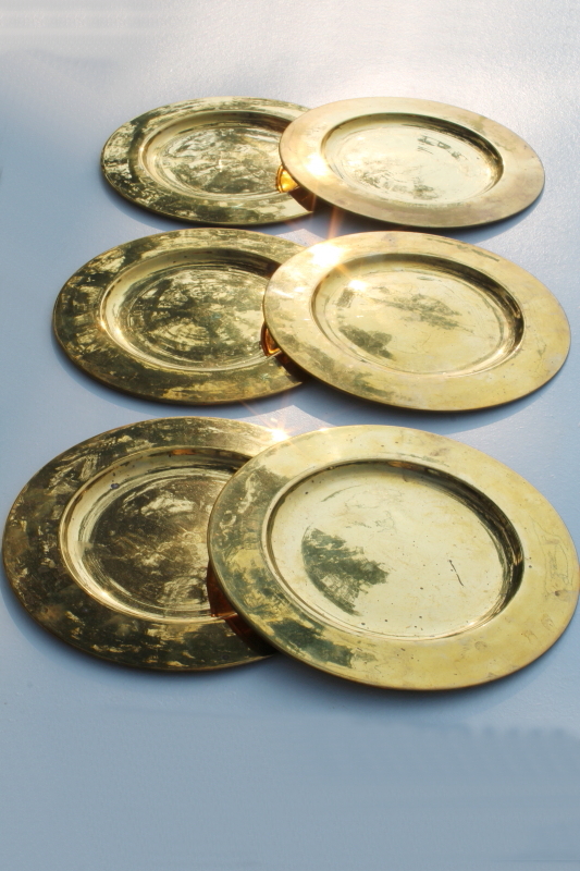 photo of set of six vintage solid brass chargers, large plates 11 and 3 quarters diameter heavy brass under plate trays #9