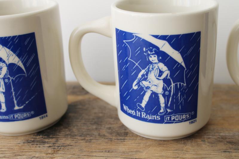 photo of set of vintage china coffee mugs, Morton salt girl 1914 - 1921 - 1956 - 1968 ad graphics #3