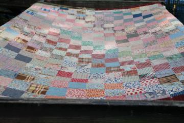 catalog photo of shabby antique patchwork quilt, early 1900s vintage cotton fabric, colorful prints 
