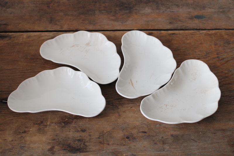 photo of shabby antique stained white ironstone china bone dishes, small crescent shaped plates  #1