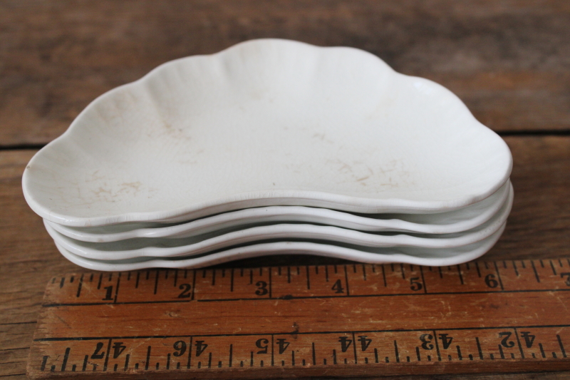 photo of shabby antique stained white ironstone china bone dishes, small crescent shaped plates  #9