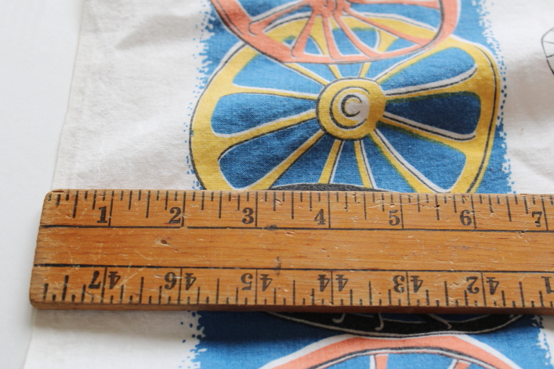 photo of shabby faded vintage cotton feed sack fabric, western wagon wheels border print  #3