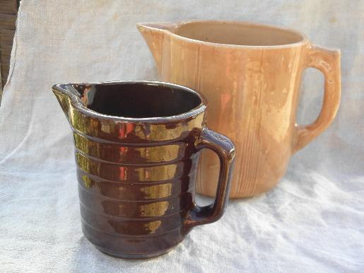 photo of shabby old brown and tan stoneware milk pitchers, vintage USA pottery #1