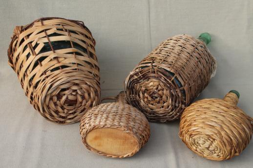 photo of shabby vintage basket covered bottles, lot of old green glass wine bottles in baskets #10