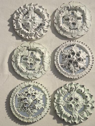 photo of shabby white painted architectural molding ornaments, rosette medallions #1