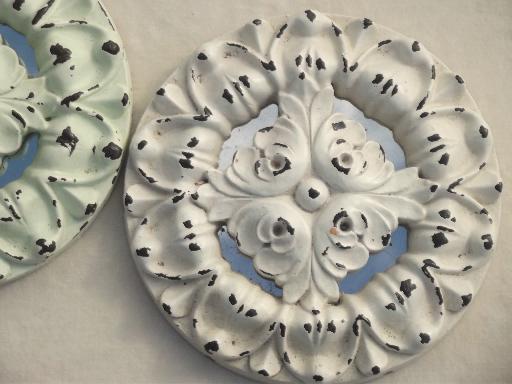 photo of shabby white painted architectural molding ornaments, rosette medallions #9