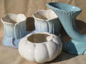 catalog photo of shades of blue and white pottery pots, planters, vases - art deco shapes