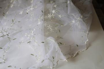 catalog photo of sheer white nylon organza fabric w/ embroidered orange blossoms, scalloped border vintage bridal veil