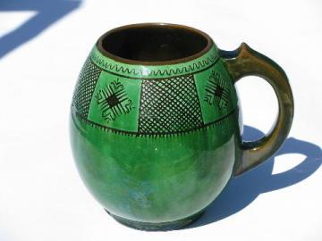 catalog photo of signed art pottery, vintage sgraffito jug or stein, incised brown/green pattern