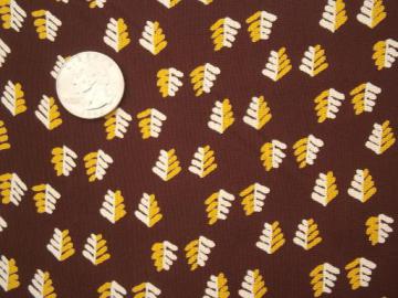 catalog photo of silky vintage rayon or poly fabric, yellow & cream leaf print on brown