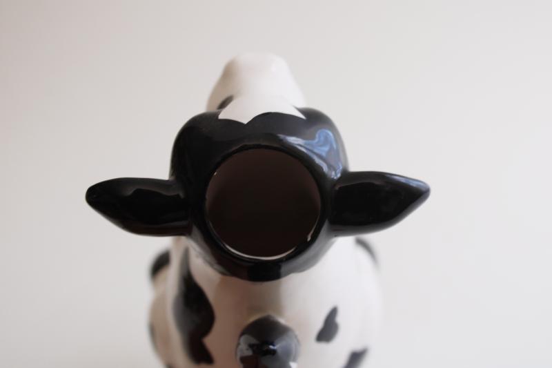 photo of sitting holstein cow creamer, black & white spotted cow pitcher 1980s vintage #3