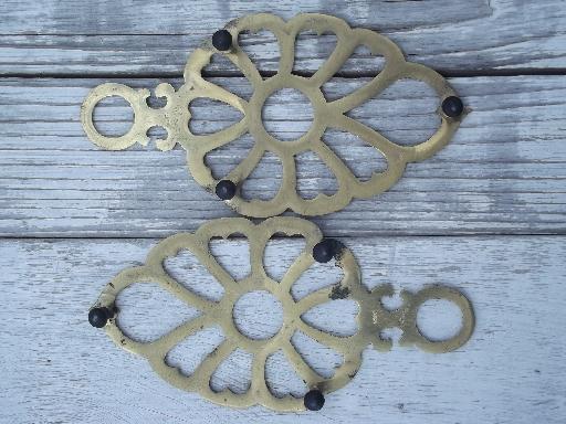 photo of six solid brass kitchen trivets, vintage Japan trivet collection #5