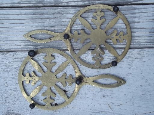 photo of six solid brass kitchen trivets, vintage Japan trivet collection #7