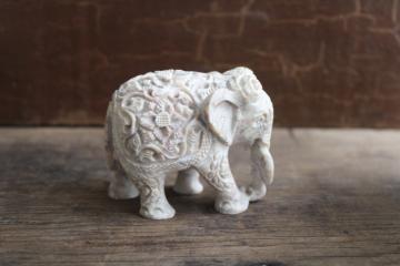 small carved elephant figurine boho flowers, cultured marble stone composition 