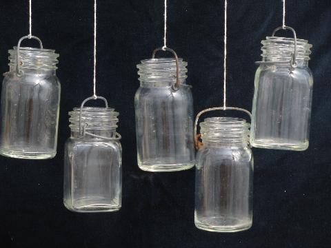 photo of small glass fruit jars w/ old wire bails, nice for hanging candle holders #1