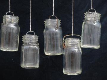 catalog photo of small glass fruit jars w/ old wire bails, nice for hanging candle holders