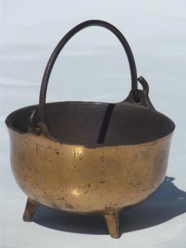 catalog photo of small old cast iron cauldron, vintage fireplace fire starter pot