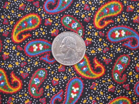 photo of small paisley print on black, retro vintage 1950s cotton fabric #1